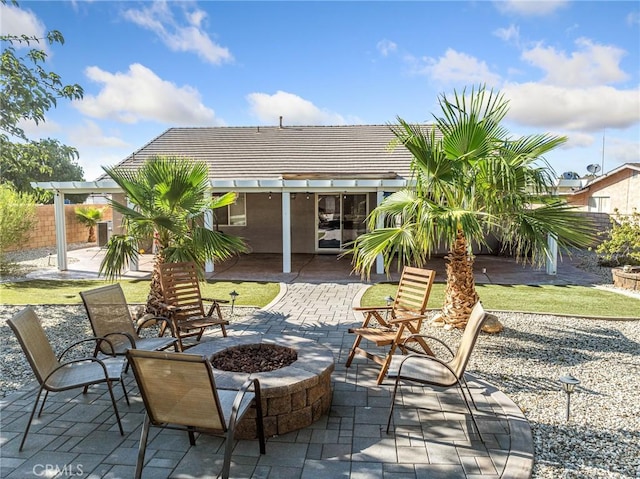27239 Peach Tree Ln, Helendale, CA 92342 - view of patio featuring a fire pit and a pergola