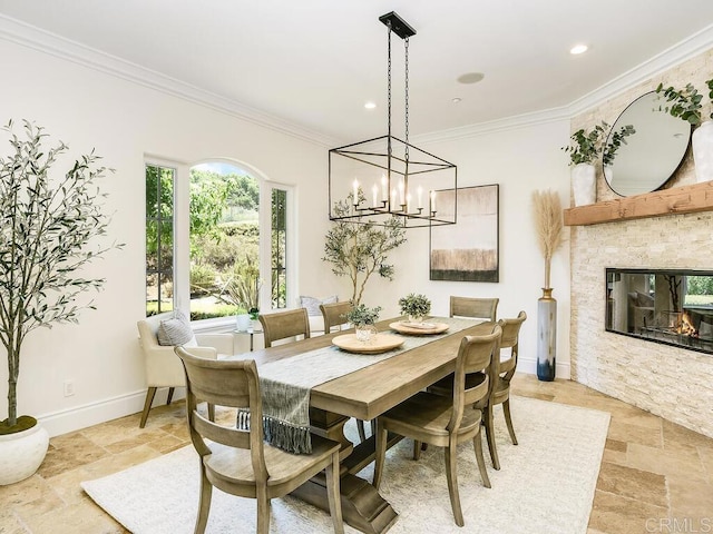 32110 Dos Ninas, Bonsall, CA 92003 - dining area featuring stone tile flooring, ornamental molding, a multi sided fireplace, recessed lighting, and a chandelier