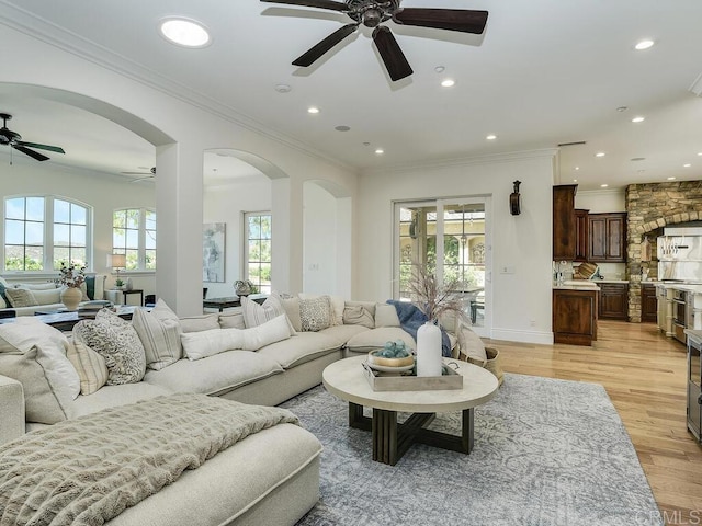 32110 Dos Ninas, Bonsall, CA 92003 - living area featuring ceiling fan, ornamental molding, arched walkways, light wood-style floors, and recessed lighting