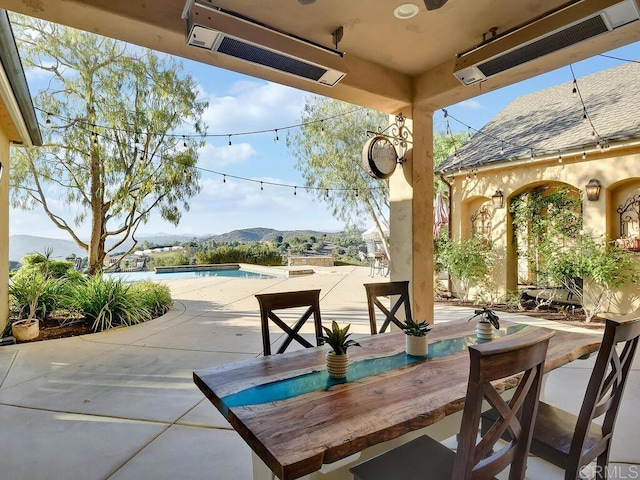32110 Dos Ninas, Bonsall, CA 92003 - view of patio featuring an outdoor pool, a mountain view, and outdoor dining space
