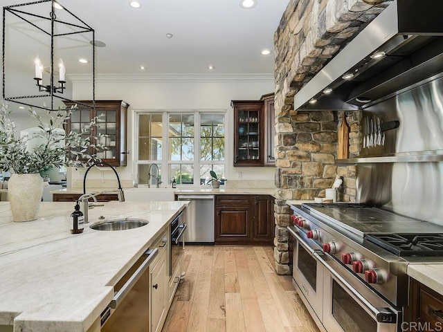 32110 Dos Ninas, Bonsall, CA 92003 - kitchen with extractor fan, stainless steel appliances, crown molding, light stone countertops, and glass insert cabinets