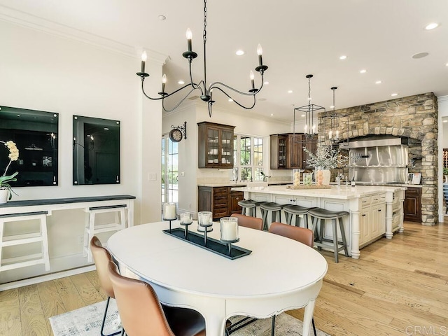 32110 Dos Ninas, Bonsall, CA 92003 - dining area featuring ornamental molding, light wood finished floors, recessed lighting, and a chandelier