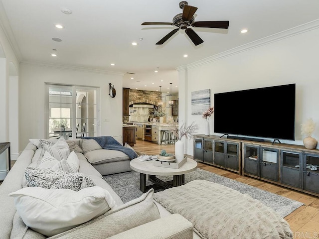 32110 Dos Ninas, Bonsall, CA 92003 - living room with light wood finished floors, crown molding, a ceiling fan, and recessed lighting
