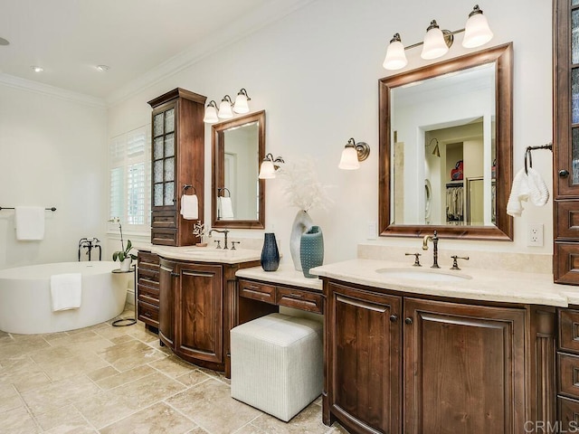 32110 Dos Ninas, Bonsall, CA 92003 - bathroom featuring two vanities, a freestanding bath, ornamental molding, and stone finish flooring