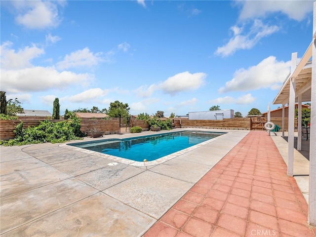 22163 Broken Lance Rd, Apple Valley, CA 92307 - view of swimming pool featuring a patio area and a fenced backyard