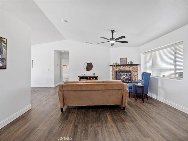 22163 Broken Lance Rd, Apple Valley, CA 92307 - living area featuring dark wood-style flooring, a ceiling fan, a fireplace, and lofted ceiling