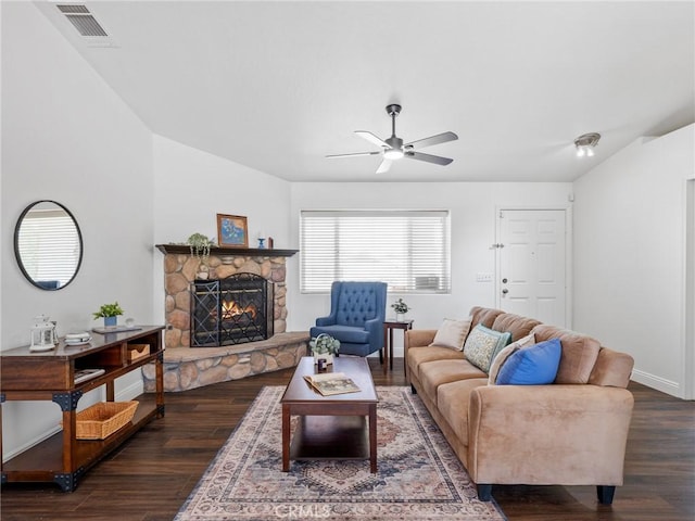 22163 Broken Lance Rd, Apple Valley, CA 92307 - living area featuring dark wood-style flooring, ceiling fan, a fireplace, and vaulted ceiling