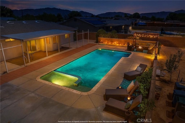 22163 Broken Lance Rd, Apple Valley, CA 92307 - view of swimming pool with a pool with connected hot tub, a patio, a mountain view, and a fenced backyard