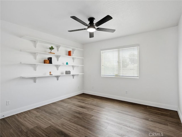 22163 Broken Lance Rd, Apple Valley, CA 92307 - spare room featuring dark wood-type flooring and a ceiling fan