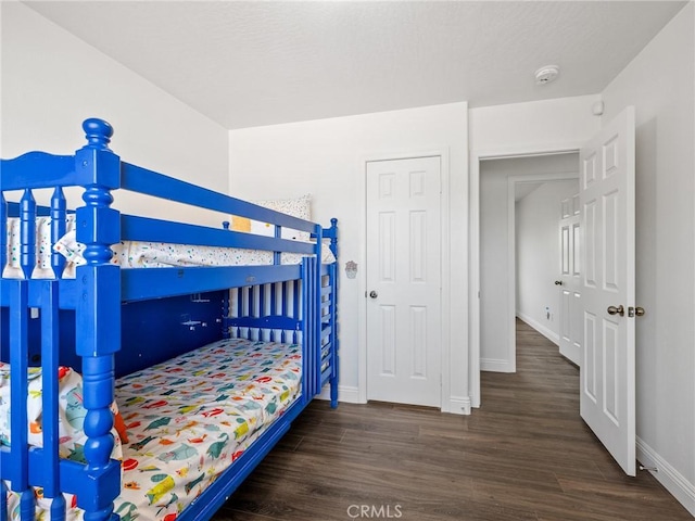 22163 Broken Lance Rd, Apple Valley, CA 92307 - bedroom with wood finished floors and baseboards