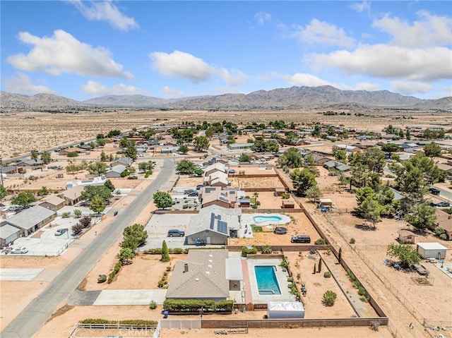 22163 Broken Lance Rd, Apple Valley, CA 92307 - aerial perspective of suburban area featuring mountains and a pool