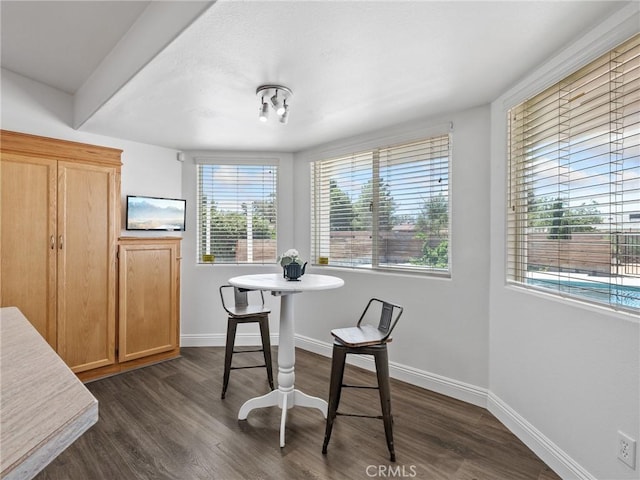 22163 Broken Lance Rd, Apple Valley, CA 92307 - dining area with plenty of natural light and dark wood finished floors