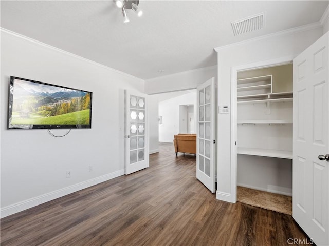 22163 Broken Lance Rd, Apple Valley, CA 92307 - unfurnished bedroom featuring french doors, crown molding, wood finished floors, and a closet