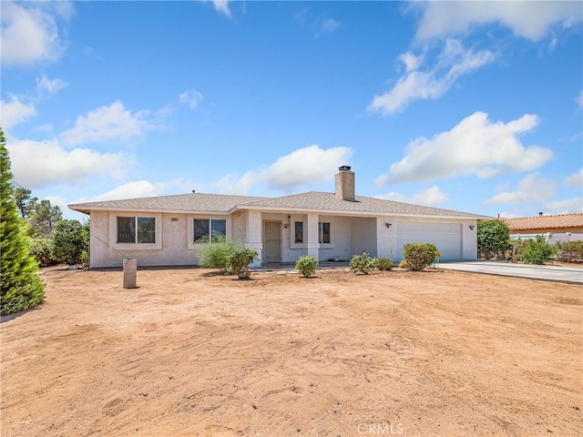 22163 Broken Lance Rd, Apple Valley, CA 92307 - ranch-style house featuring driveway, a garage, and a chimney