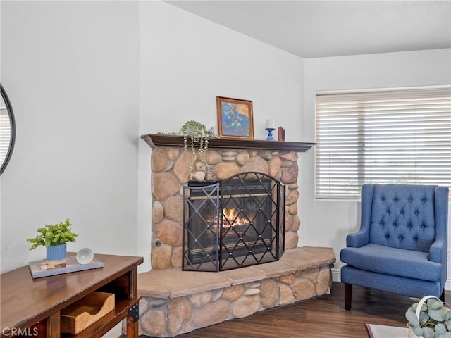 22163 Broken Lance Rd, Apple Valley, CA 92307 - living room featuring wood finished floors and a stone fireplace