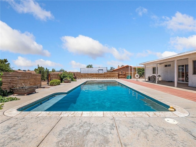 22163 Broken Lance Rd, Apple Valley, CA 92307 - view of swimming pool with a fenced backyard, a patio, and a gate