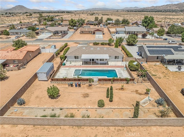 22163 Broken Lance Rd, Apple Valley, CA 92307 - aerial view of residential area with a pool area and a mountainous background