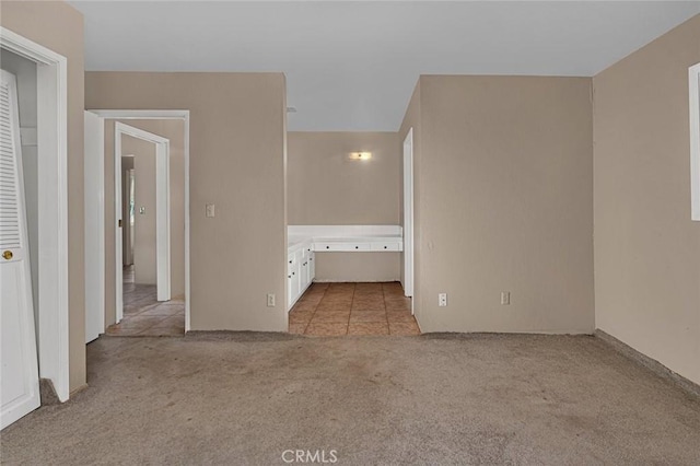 45660 Shain Ave, Dos Palos, CA 93620 - unfurnished bedroom featuring light carpet and ensuite bath