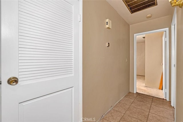 45660 Shain Ave, Dos Palos, CA 93620 - hallway featuring light tile patterned floors