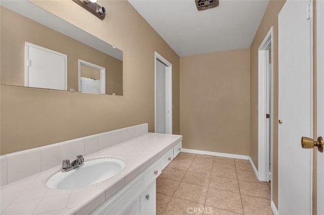 45660 Shain Ave, Dos Palos, CA 93620 - bathroom featuring vanity and tile patterned floors