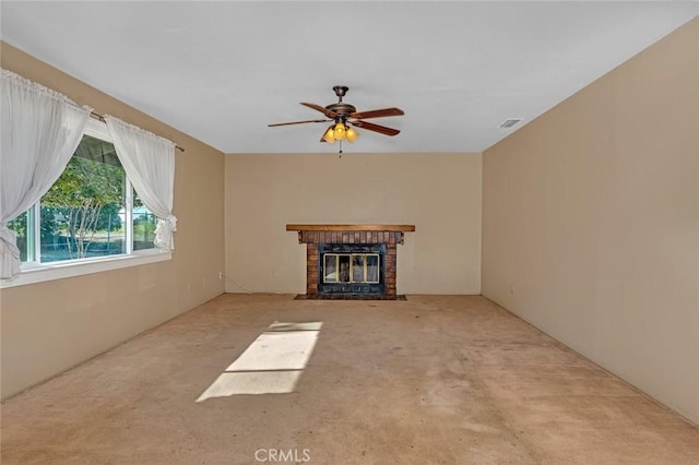 45660 Shain Ave, Dos Palos, CA 93620 - unfurnished living room featuring carpet, a fireplace, and ceiling fan