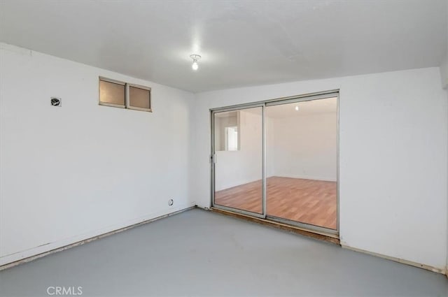23405 Ramona Ave, Apple Valley, CA 92307 - spare room featuring concrete floors