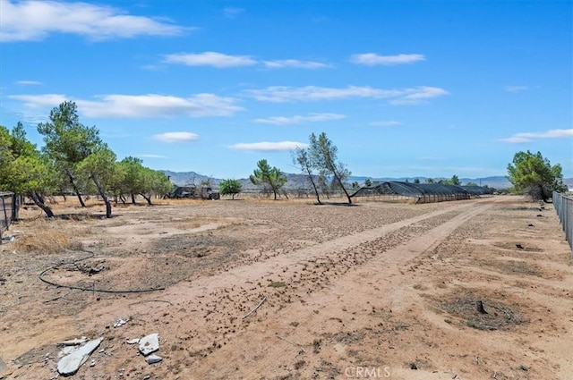 23405 Ramona Ave, Apple Valley, CA 92307 - view of yard featuring a mountain view and a rural view