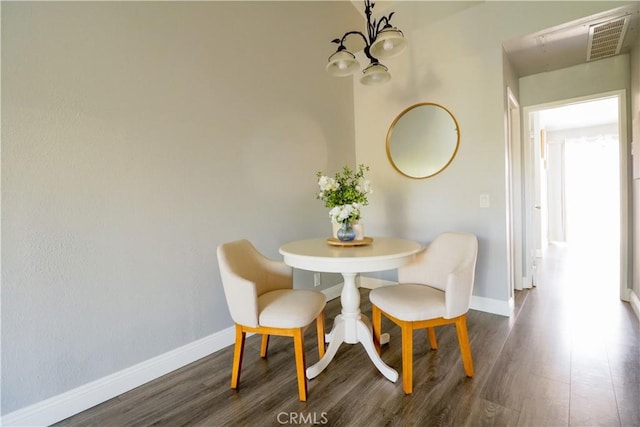 14005 Arthur Ave Unit 21, Paramount, CA 90723 - dining room featuring a chandelier and dark wood finished floors