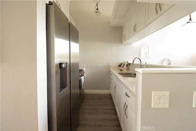 14005 Arthur Ave Unit 21, Paramount, CA 90723 - kitchen with stainless steel fridge with ice dispenser, dark wood-type flooring, light countertops, and white cabinetry