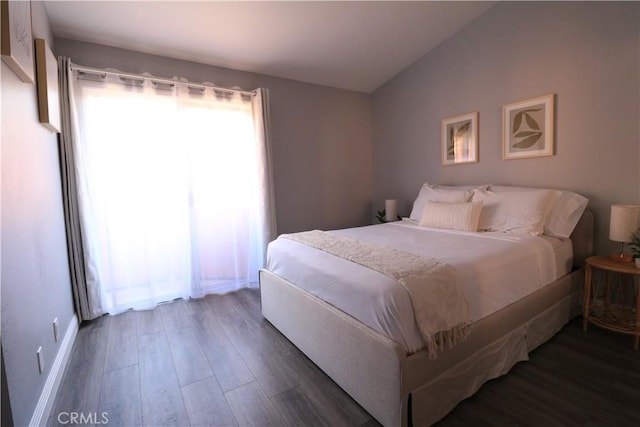14005 Arthur Ave Unit 21, Paramount, CA 90723 - bedroom featuring dark wood-style flooring and lofted ceiling