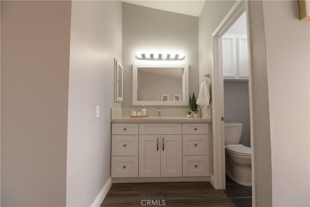14005 Arthur Ave Unit 21, Paramount, CA 90723 - bathroom featuring vanity and wood finished floors
