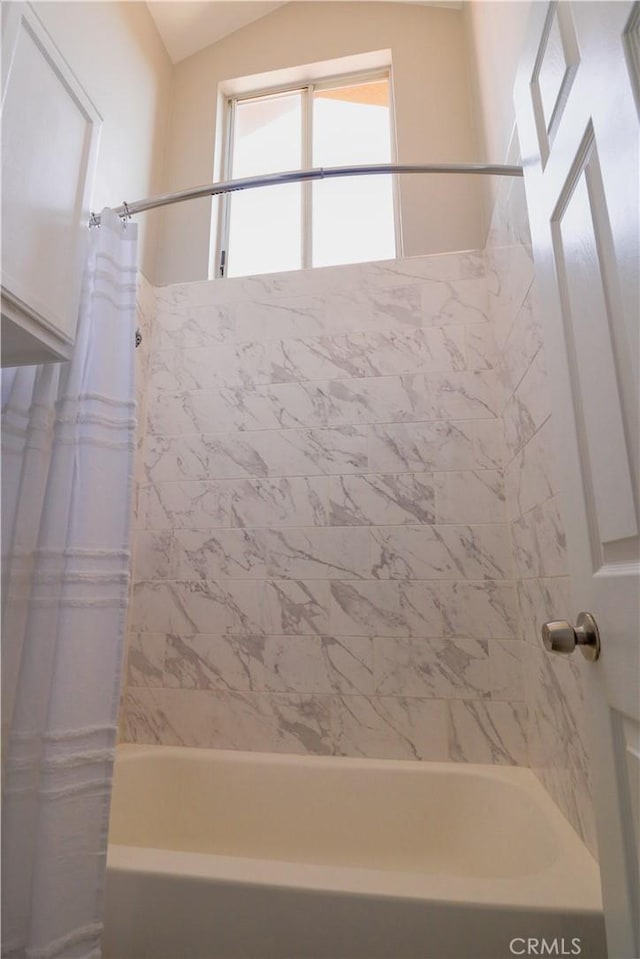 14005 Arthur Ave Unit 21, Paramount, CA 90723 - full bathroom with shower / bath combo with shower curtain and vaulted ceiling