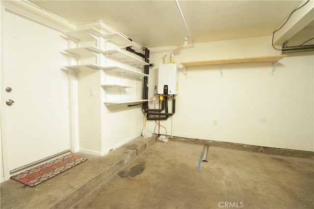 14005 Arthur Ave Unit 21, Paramount, CA 90723 - basement featuring water heater and baseboards