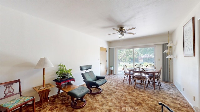 125 Hilton St, Madera, CA 93637 - carpeted dining room with a ceiling fan