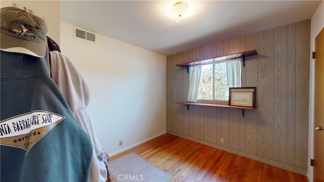 125 Hilton St, Madera, CA 93637 - interior space with wood finished floors and wood walls