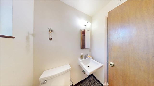125 Hilton St, Madera, CA 93637 - half bath featuring toilet and a sink