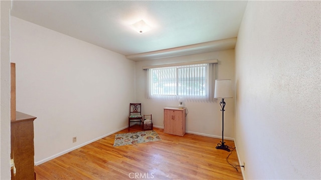 125 Hilton St, Madera, CA 93637 - unfurnished room featuring wood finished floors and baseboards