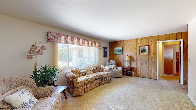 125 Hilton St, Madera, CA 93637 - living room featuring wooden walls and carpet floors