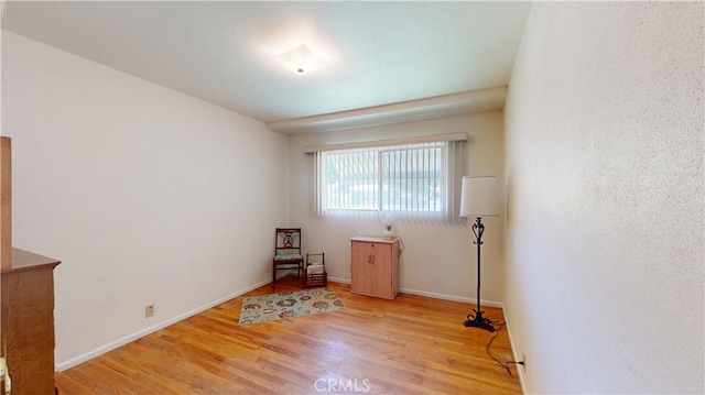 125 Hilton St, Madera, CA 93637 - unfurnished room featuring wood finished floors