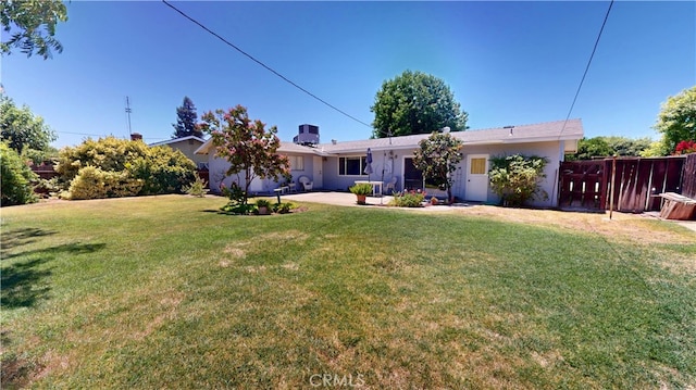 125 Hilton St, Madera, CA 93637 - back of property featuring a patio area and stucco siding
