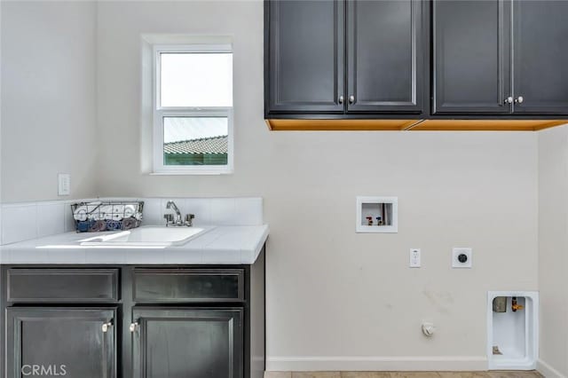 860 Fritz Dr, Los Banos, CA 93635 - washroom featuring hookup for a washing machine, electric dryer hookup, cabinet space, and hookup for a gas dryer