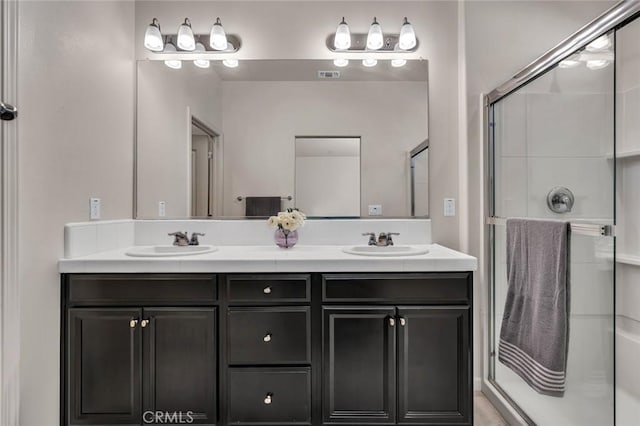 860 Fritz Dr, Los Banos, CA 93635 - full bathroom with double vanity and a shower stall