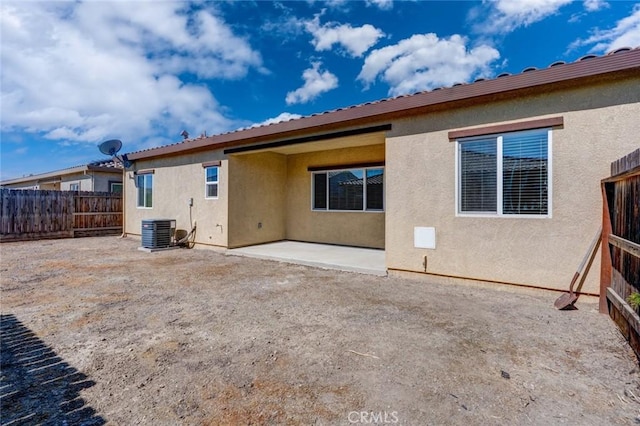 860 Fritz Dr, Los Banos, CA 93635 - back of house with stucco siding and a patio area