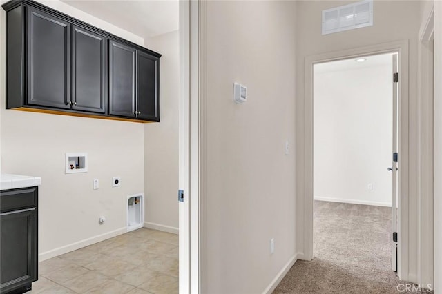 860 Fritz Dr, Los Banos, CA 93635 - laundry area with electric dryer hookup, hookup for a washing machine, gas dryer hookup, and cabinet space
