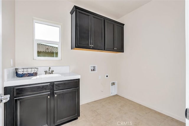 860 Fritz Dr, Los Banos, CA 93635 - laundry room featuring electric dryer hookup, cabinet space, washer hookup, and hookup for a gas dryer
