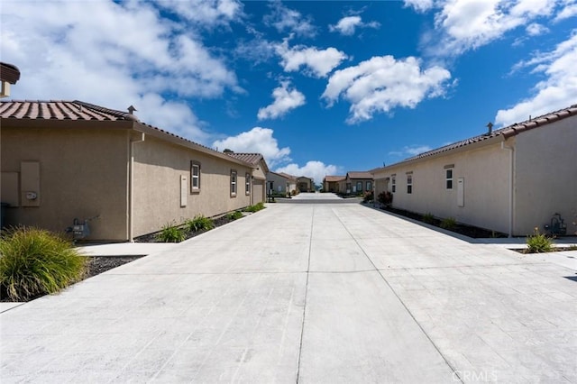 860 Fritz Dr, Los Banos, CA 93635 - view of concrete road featuring a residential view