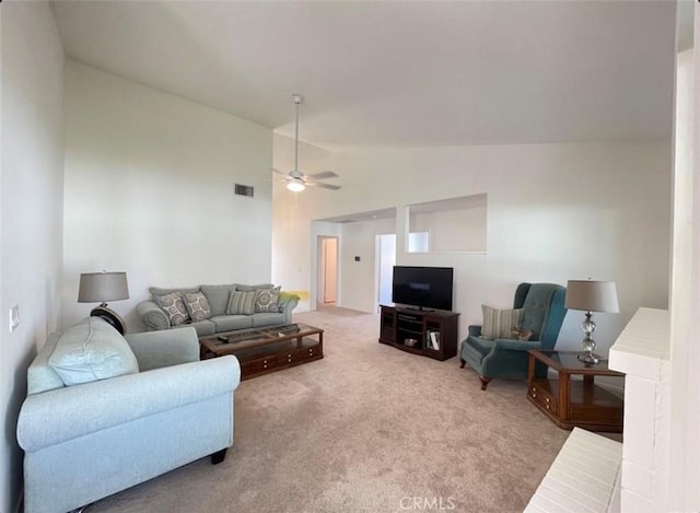6287 Tuckaway Ave, Banning, CA 92220 - carpeted living room with lofted ceiling and a ceiling fan