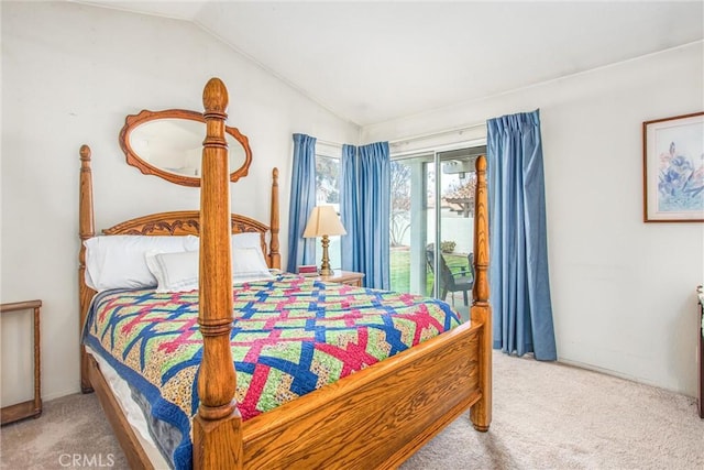 6287 Tuckaway Ave, Banning, CA 92220 - carpeted bedroom featuring access to exterior and vaulted ceiling
