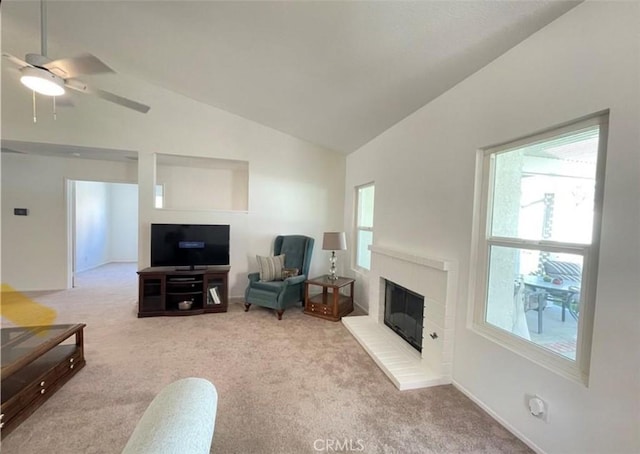6287 Tuckaway Ave, Banning, CA 92220 - living area featuring carpet, a fireplace, ceiling fan, and high vaulted ceiling
