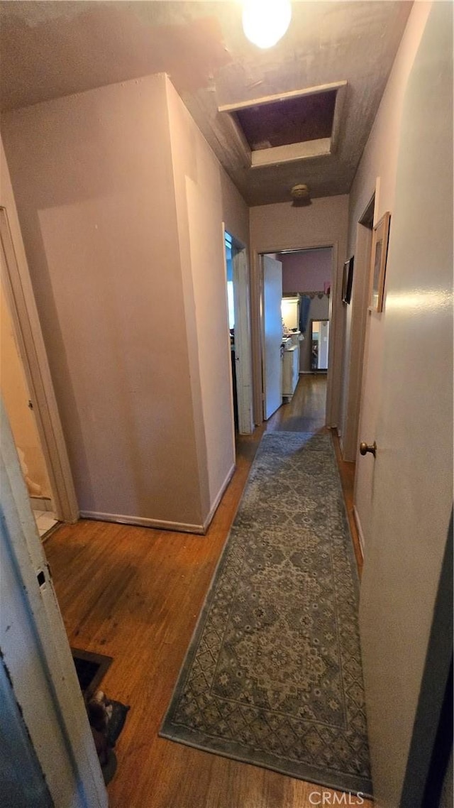 7044 Pellet St, Downey, CA 90241 - hallway with wood finished floors and baseboards